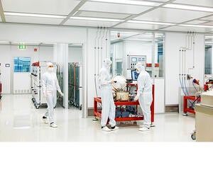 Associates working in a clean room environment