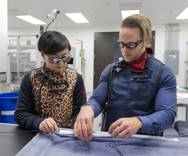 Two Associates working in a lab