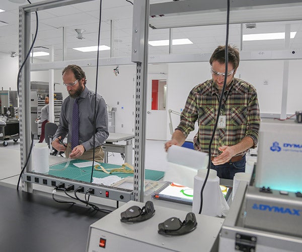 Two Associates working in the lab