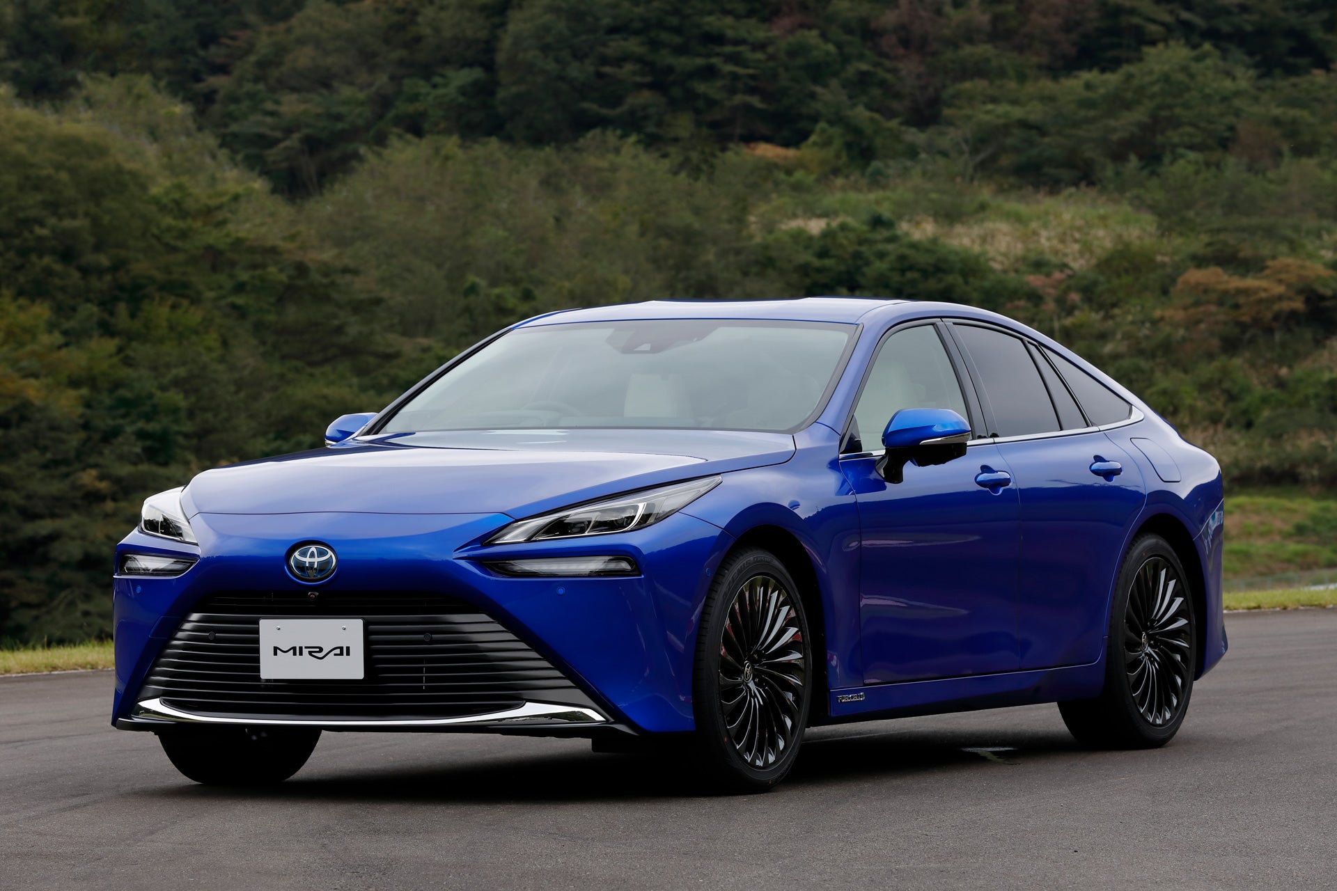 A blue Toyota MIRAI on the road