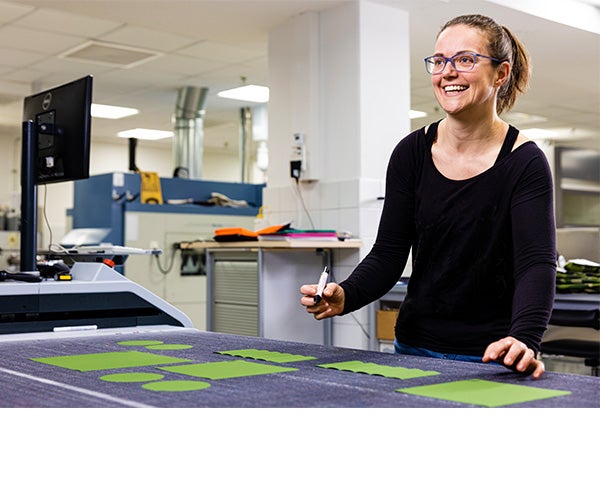 An Associate working with GORE-TEX material.