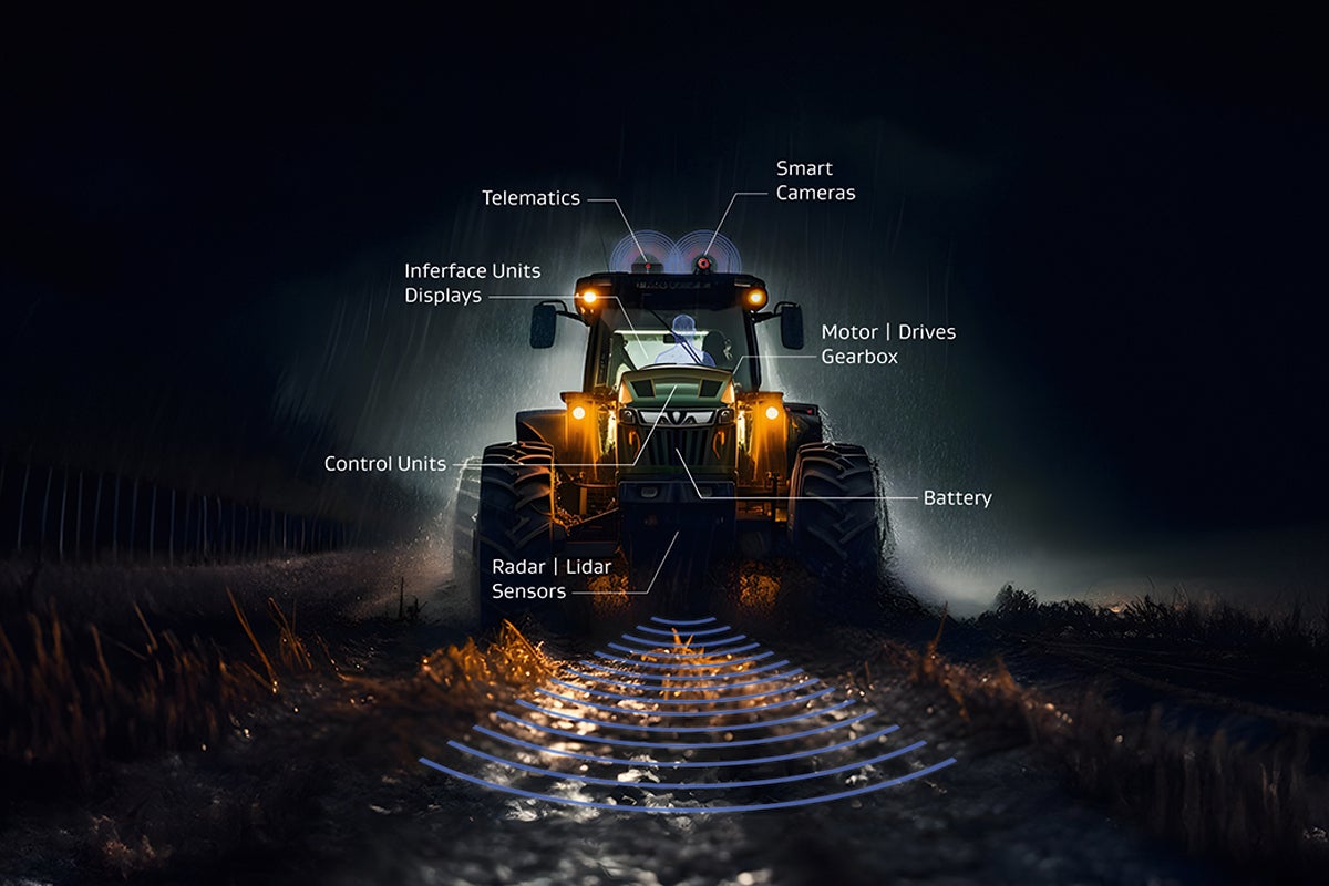 Photographic image of a tractor with labeling on relevant electronic components.