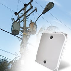 image of telephone and power lines with a wireless router overtop