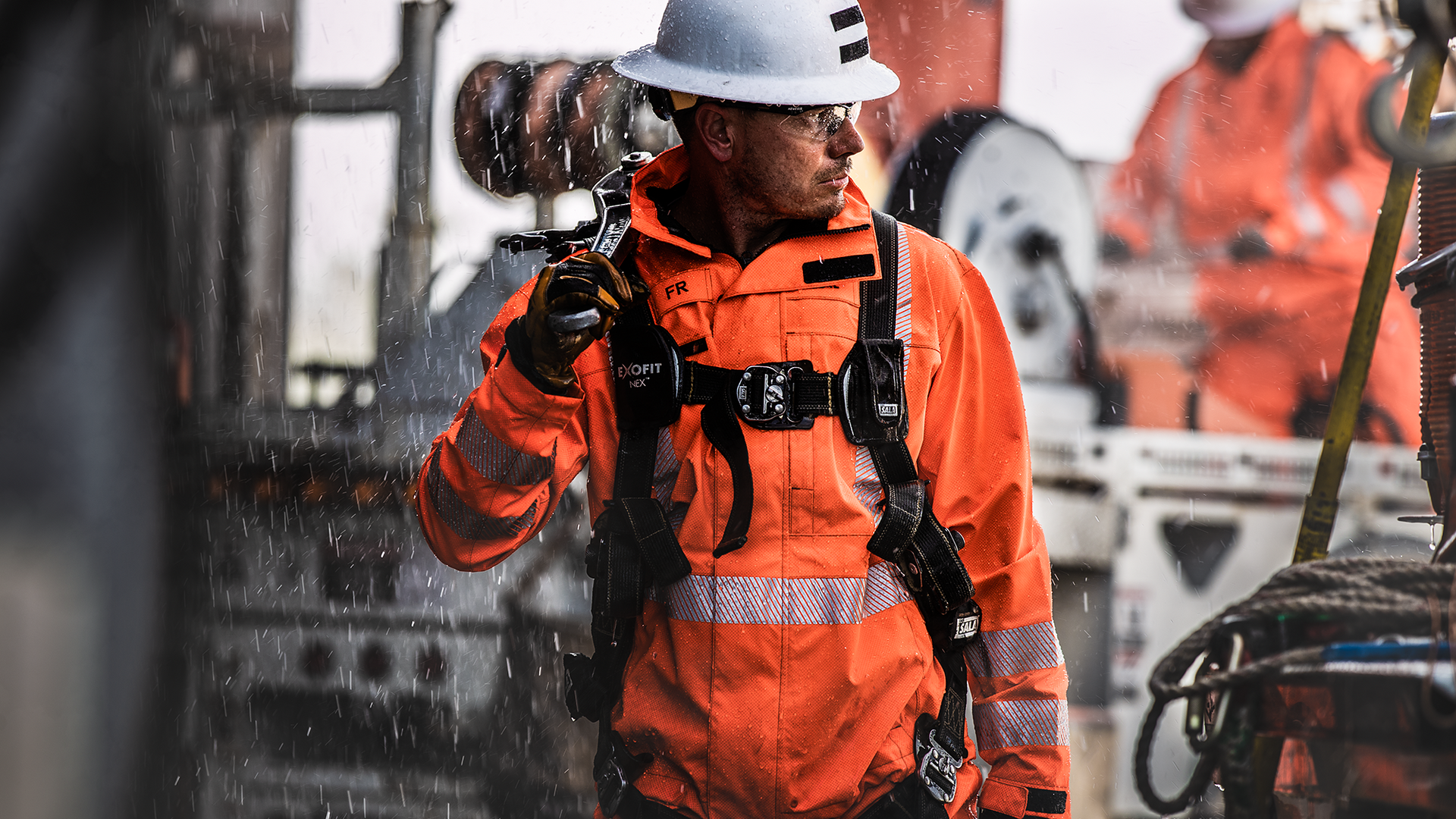 utility worker on a job site with protective gear on