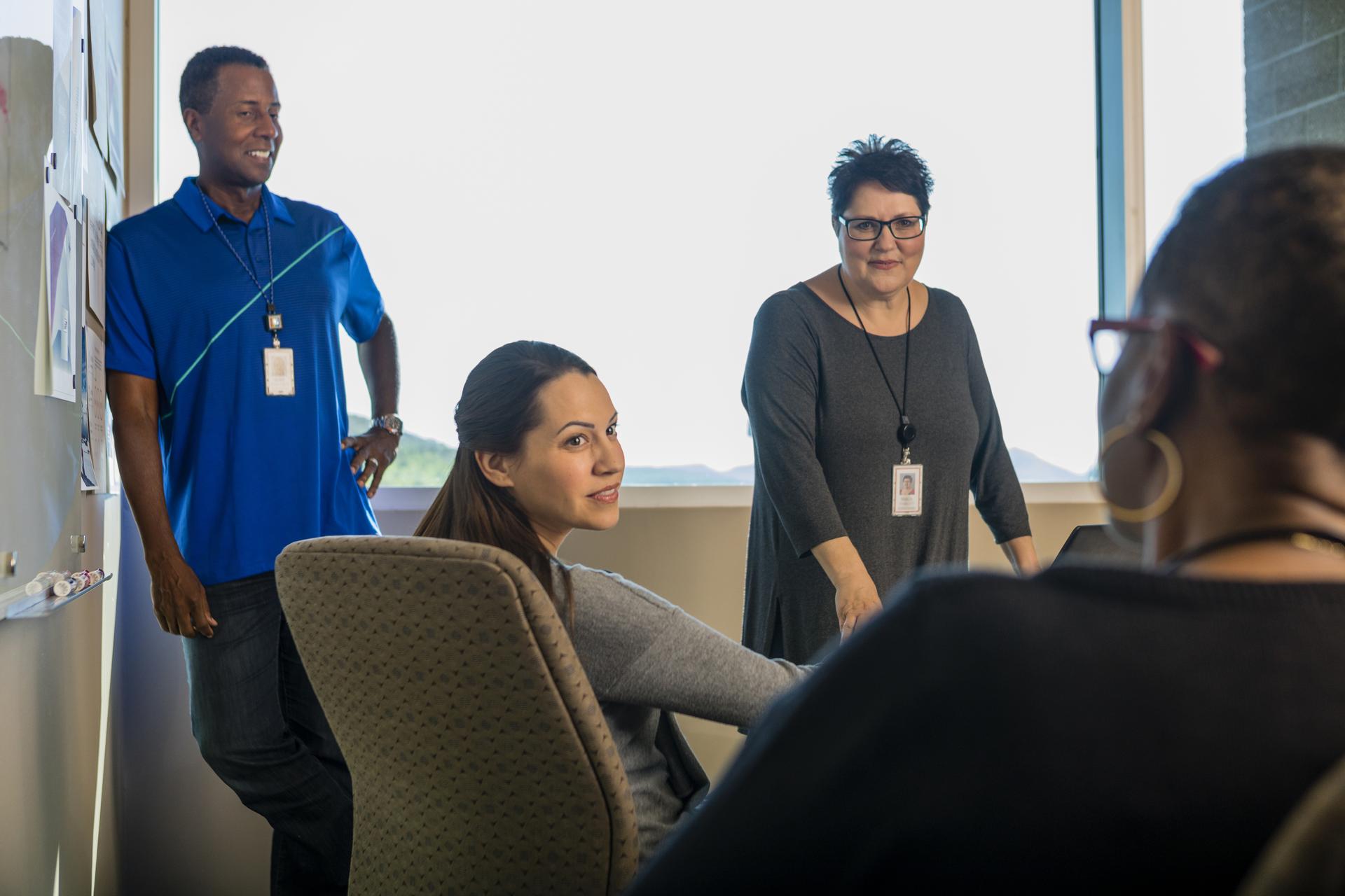 associates meeting in a conference room