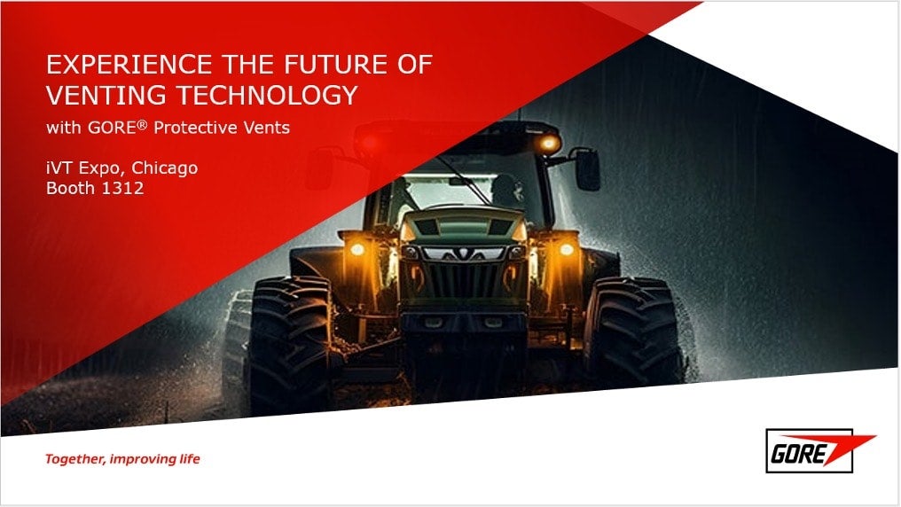 A tractor with it's engine on under a dark and rainy environment. Text reads: Experience The Future of Venting Technology with GORE Protective Vents. iVT Expo, Chicago Booth 1312