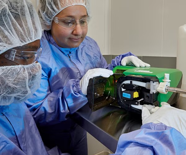 pharmbio professionals with peristatic pump