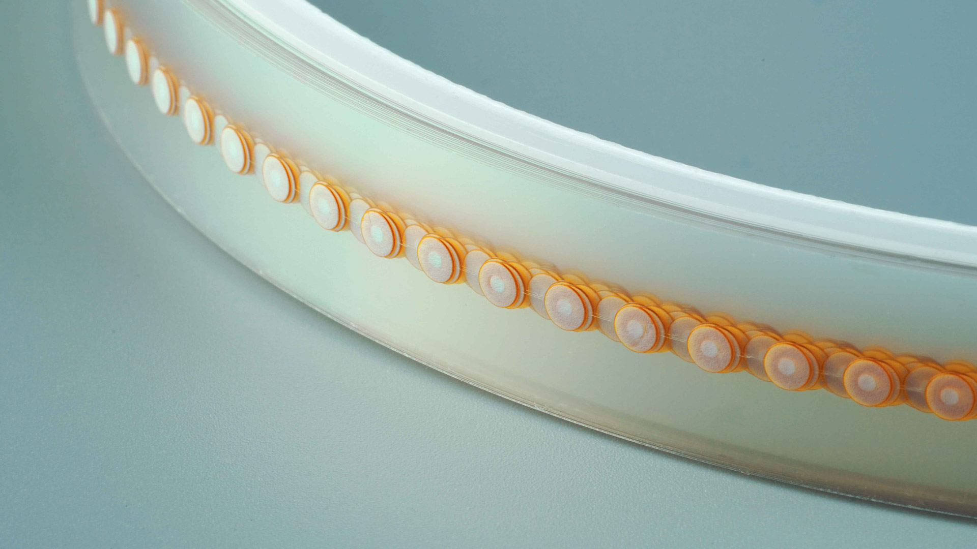 Close up of a roll of GORE MEMS Protective Vents (Style 100)