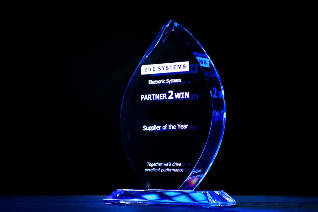 Glass award from BAE Systems recognizing Partner 2 Win Supplier of the Year.