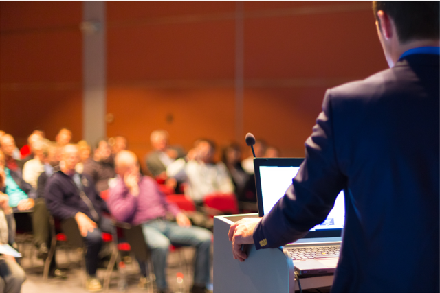 Presenter with an audience