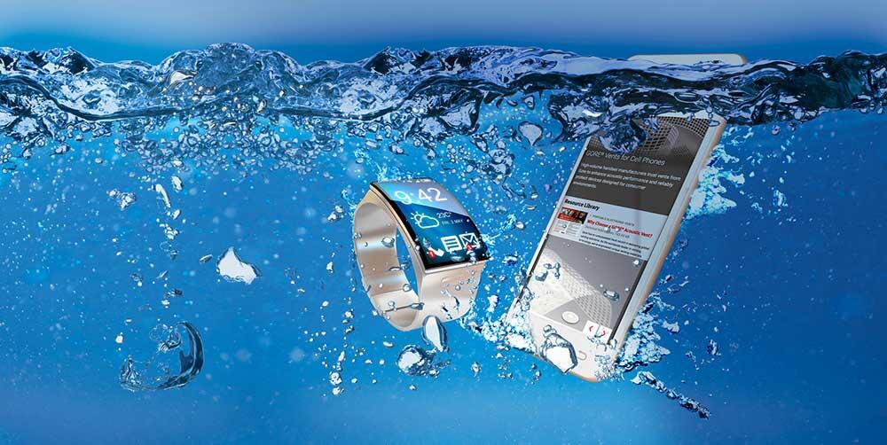 Smart phone and smart watch submerged in water
