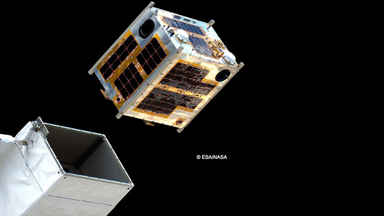 Cube satellite being launched into space