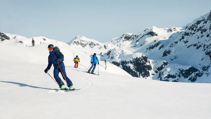 skiers on a snowy mountain wearing gore-tex products