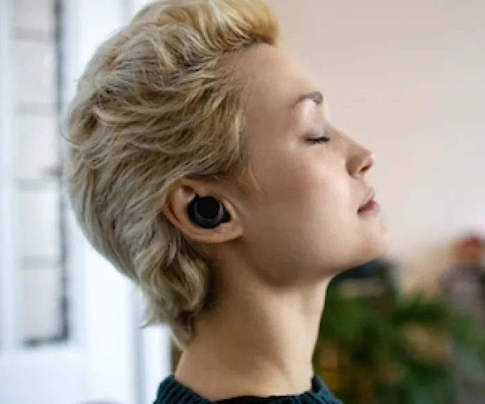 woman wearing earbuds