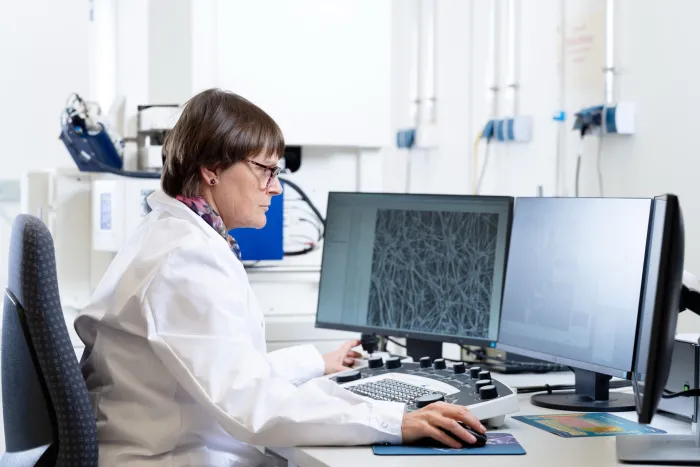 life sciences venting worker at computer