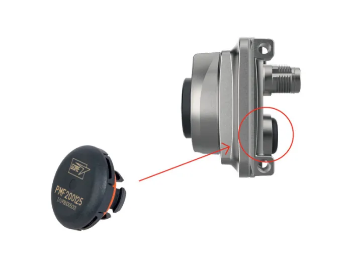 Illustration of a pressure sensor assembly with a detachable protective cap. On the left, a black cap labeled “PMF200125” with the Gore logo is shown separated from the device. A red arrow points to the side of the metal sensor housing on the right, where the cap attaches over a small circular vent area, highlighted with a red circle. The metal device includes a threaded connector and mounting flange.