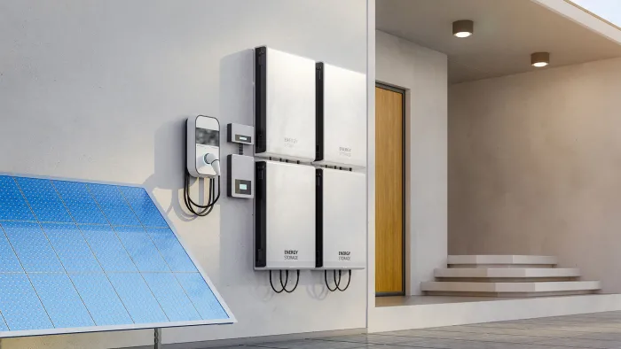 Residential battery storage systems mounted on wall of house