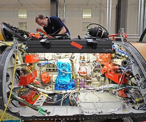 Cables attached to system components in a defense airframe.