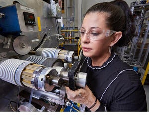 An Associate working in production.