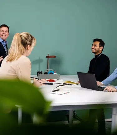 associates working together in a collaboration space