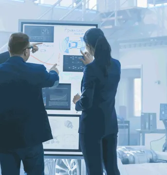 People looking at computer screen