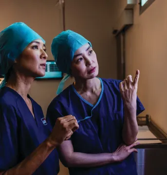 two doctors reviewing xrays