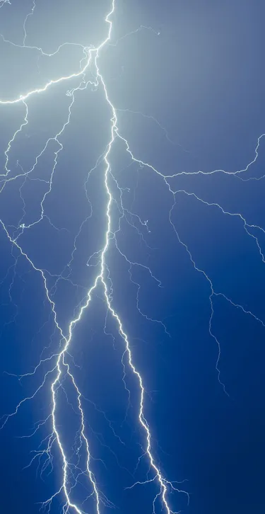 Lightning in a dark sky, symbolizing electrostatic discharge