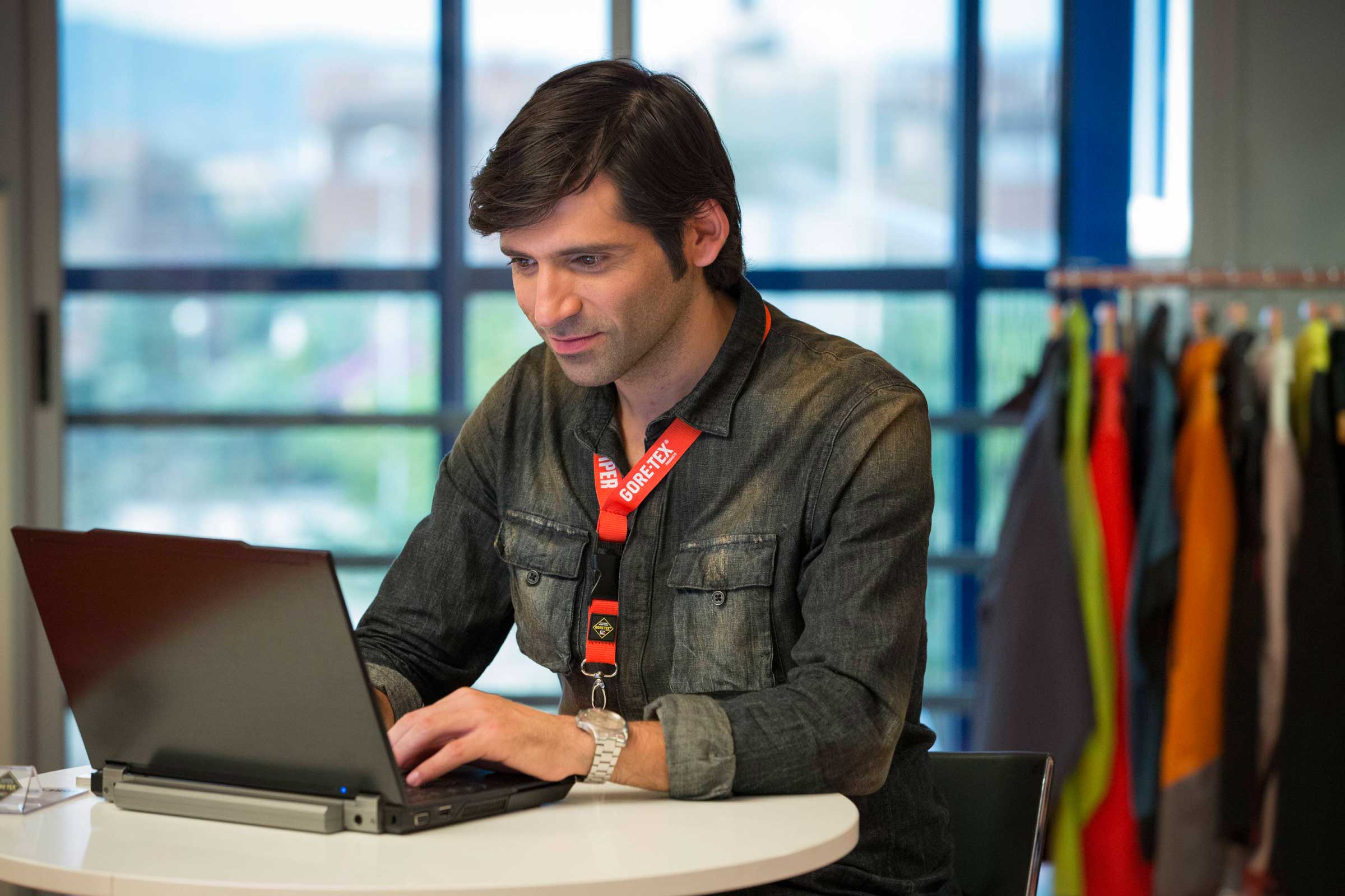 Man sitting at a laptop
