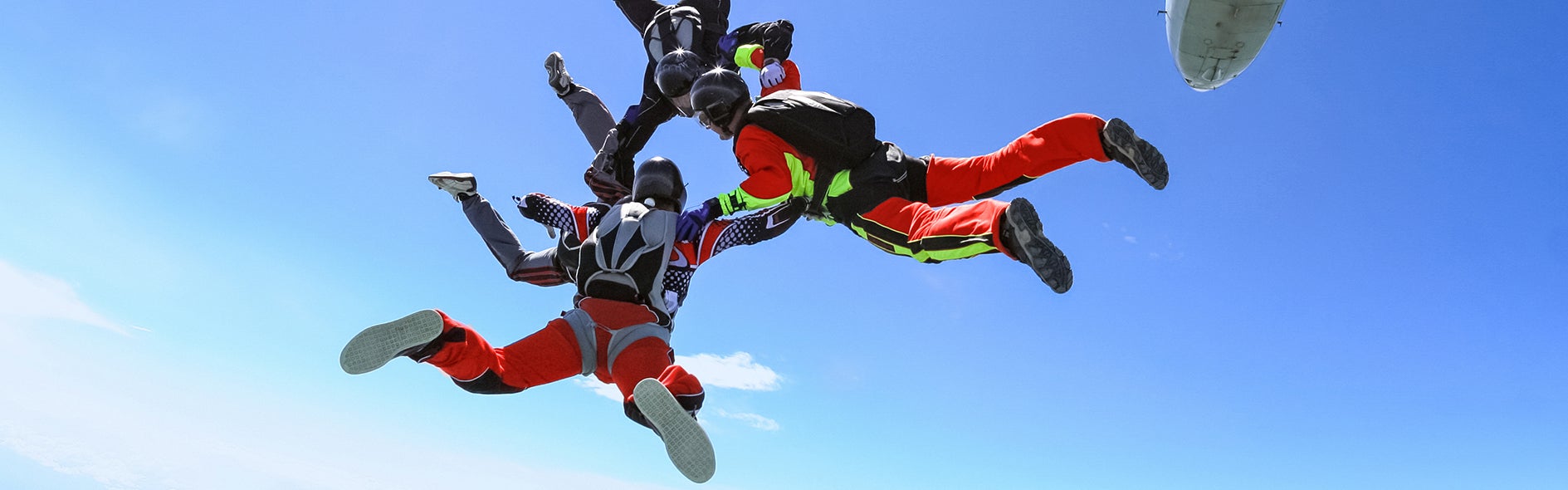 Image of skydivers having a thrilling experience. Compliance with chemical regulations on the other hand shouldn’t be thrilling.