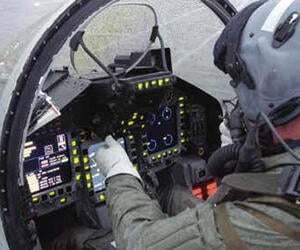 Pilot In Military Aircraft Cockpit